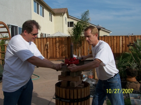 Mike and Roger prepare the press for the grape crush