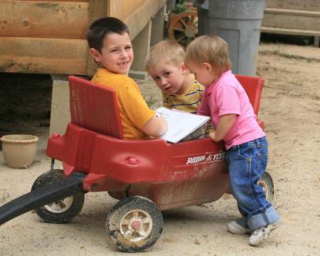 Dillon, Sam and Isabella in the wagon