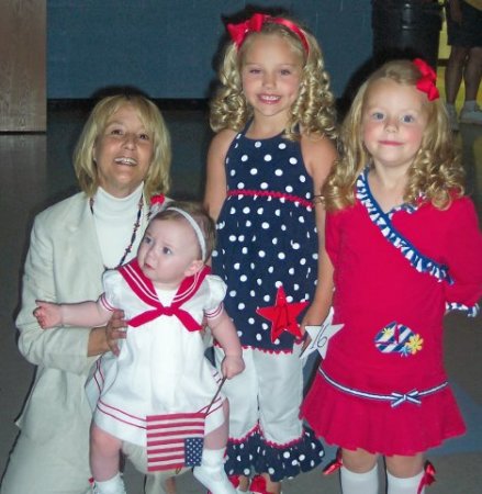 My three Grandaughters and I at a beauty pageant.