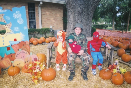 My four boys in the pumpkin patch