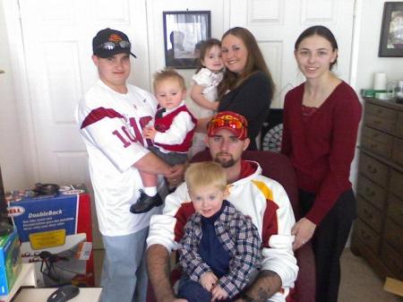 my two kids and there familys james red hat amber holding granddaughter