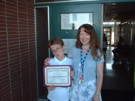 Steph and son Ryan on his 8th Grade Graduation