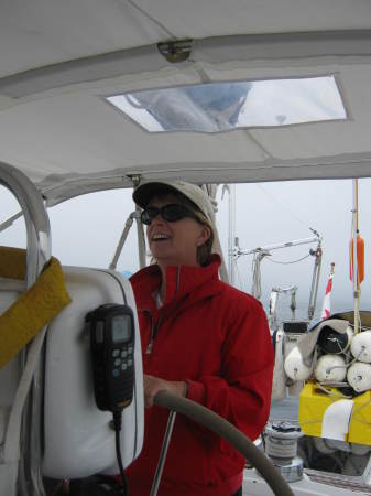 At the helm of 47' Hylas sailboat