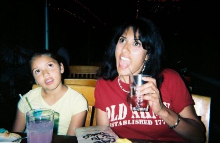Mother and daugther being goofy at dinner time