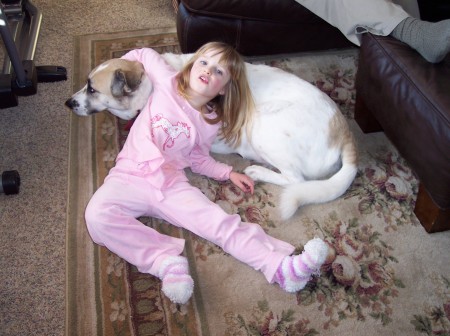 Grandaughter- Olivia and our dog Frosty