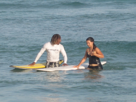 Kelly and Junior surfing Barbados Summer 2007