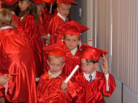 Ryan with friends (in cap & gown)