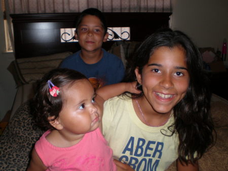 My daughter in the yellow, my niece in the pink and my son in the background 2007