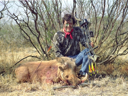 Don with warthog bowkill...northern Transvaal, South Africa 1989