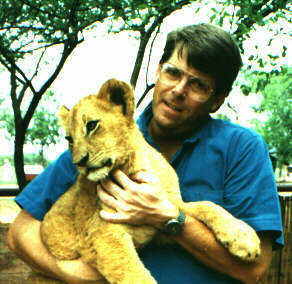 Relaxing with baby Lion King in South Africa