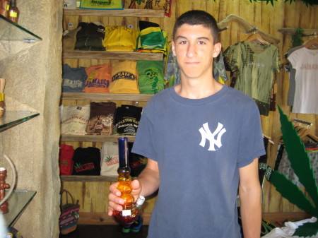 My son Ralph in Jamaica Holding a bong
