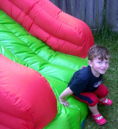 My son in his bounce house-