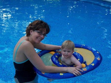 Me and my grandson in our pool