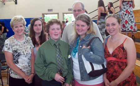 Whole family at  John's 8th Grade grad