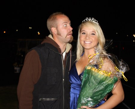 Cassie homecoming court-Travis being goofy :)