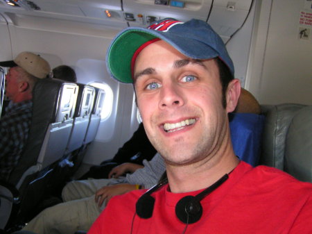 Adam on our flight home from Mexico