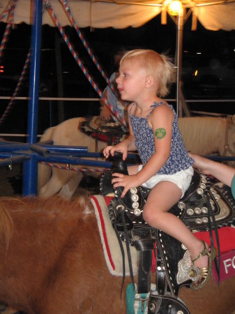 My niece riding a pony