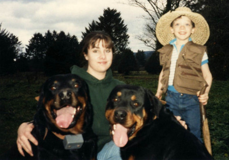 Me, my little brother Nathaniel and the rotts, c. 1986.