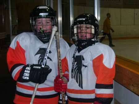My little hockey star, Spencer on the left.