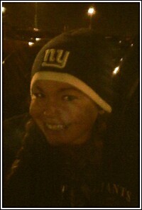 Me in my pigtails and beanie at the Giants Game!