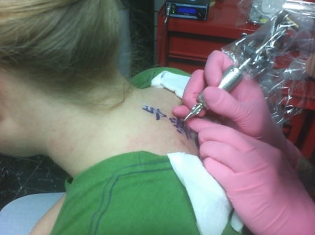 Linda getting inked