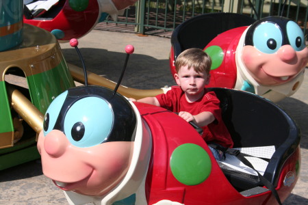 Nathan riding the Ladybug