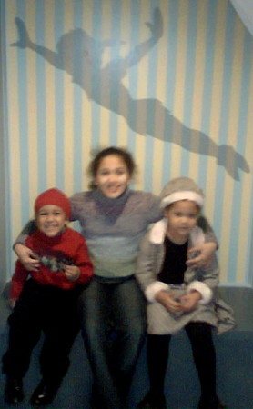 Three of my precious kids in the Disney Store