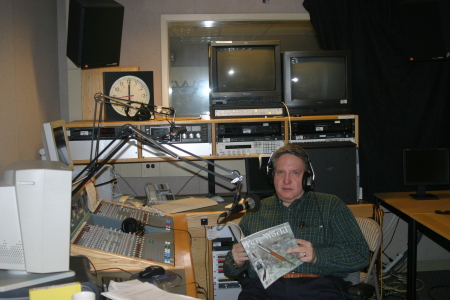 Engaged in a Trans-Atlantic interview by the British Broadcasting Corporation (shown in BBC's Washington DC studio)