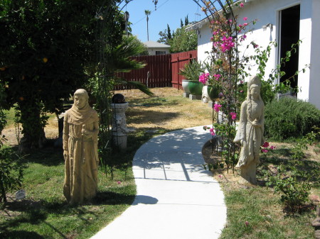 East (Quan Yin on the right) meets West (St. Francis of Asissi on the left) in my garden