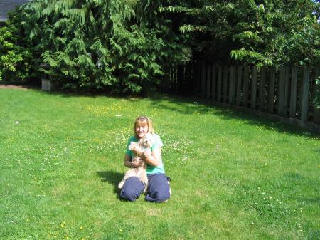 Me with Jude, my dog,at home playin in yard