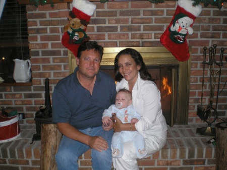 Christmas 2006 with husband Jeff and grandson John IV