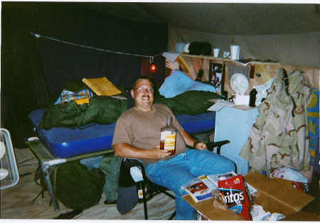 Enjoying a care package from home while in the Sandbox. Operation Iraqi Freedom / March '03