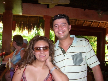 Max and Neysla at the bar in Cancun