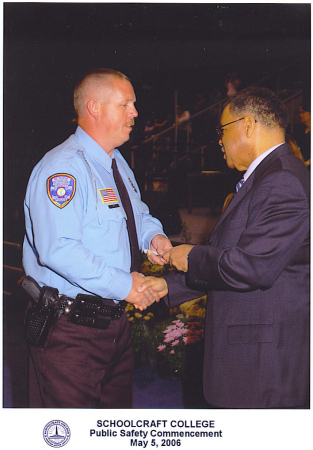 David at his police reserve graduation.