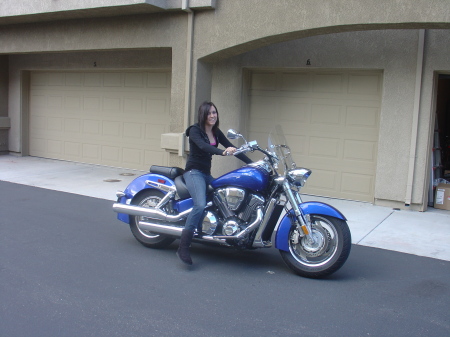 My daughter posing on my bike