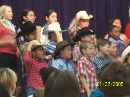 Sara ( White cowboy hat at school )