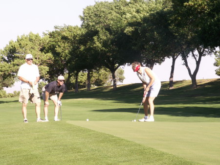 GOLFING IN  A HILL AFB TOURNAMENT