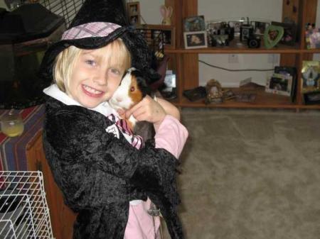 Cleary in her Halloween costume, with her sidekick, Wilbur the super guinea!