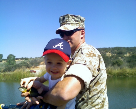 Daddy and son catching baby brim!