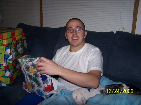 My Husband, Dean, opening his Christmas presents from me