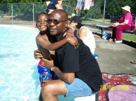 My husband Labi and Malcolm at the pool