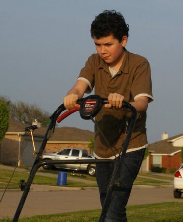 Joe mowing the yard