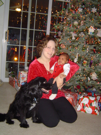my youngest daughter Angela Joly and 1st grandson Kaeden born 11-3-06 and her dog Bubba