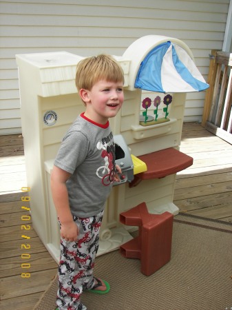 With his new outdoor kitchen