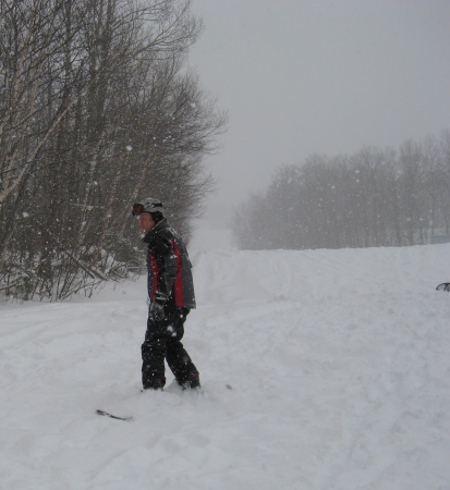 Me learning to snowboard.