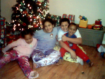 My four kiddos in their jammies at Christmas time.