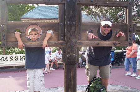 My husband "Joe" and Mitchell in Disney