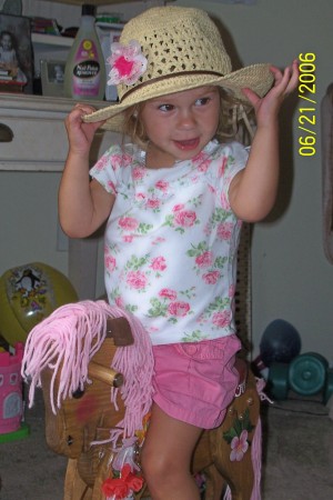 Abby being silly on her rocking horse