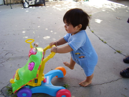 My grandson Manuelito taking his first steps 9 months june 07