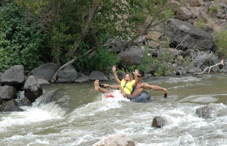 Gab & Dad tubing down the Rio Grande in Taos
